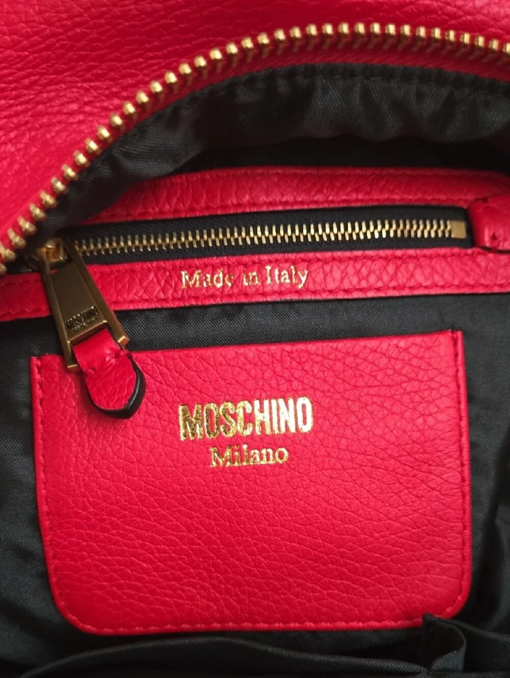 Moschino Red Pebbled Leather Mini Backpack with Gold Logo